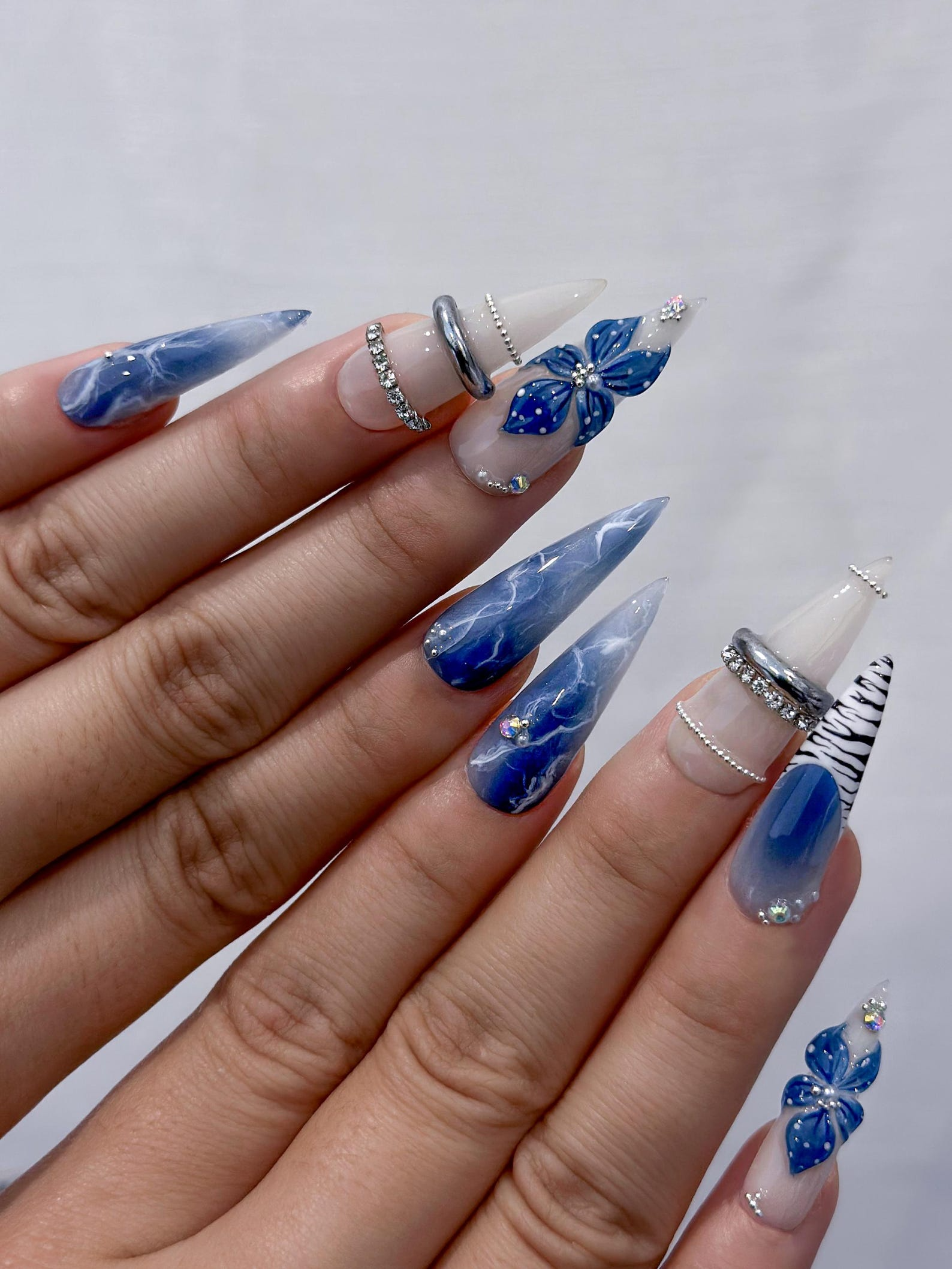Blue Marble Blossom Press On Nails for Spring Blue | Handmade Nude & Sapphire Nails with Floral Art | Elegant Stiletto Nail Design |JB2890EC